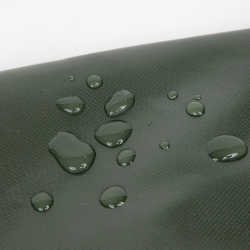 Water droplets on olive water-resistant canvas pet carrier tote fabric