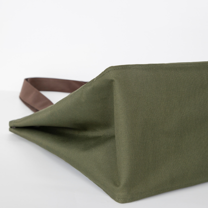 Folded base corner detail of olive canvas pet carrier tote