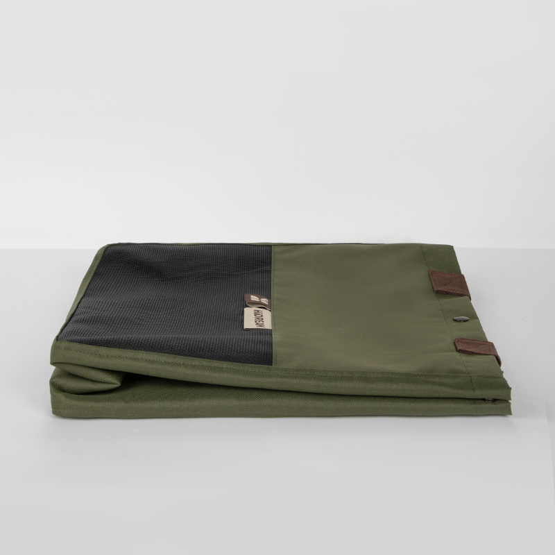 Folded olive and cream canvas pet carrier tote