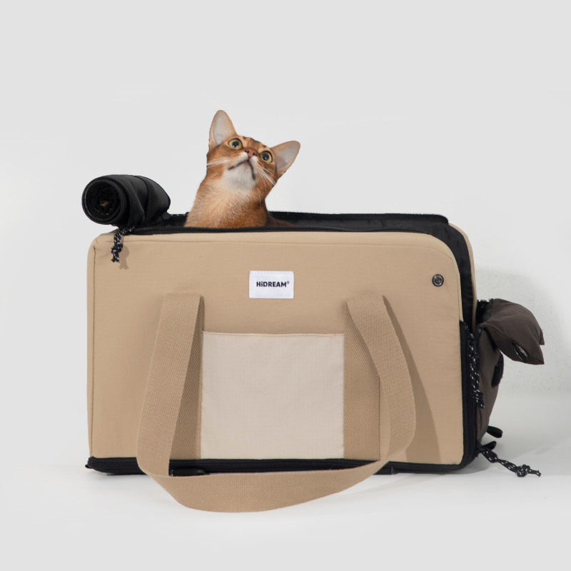 Cat peeking over beige breathable center console pet car seat