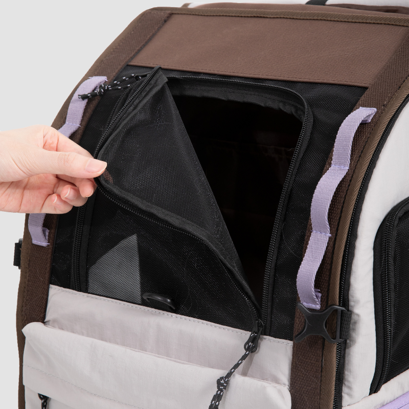 Hand opening black mesh panel on ergonomic anti-sag pet backpack