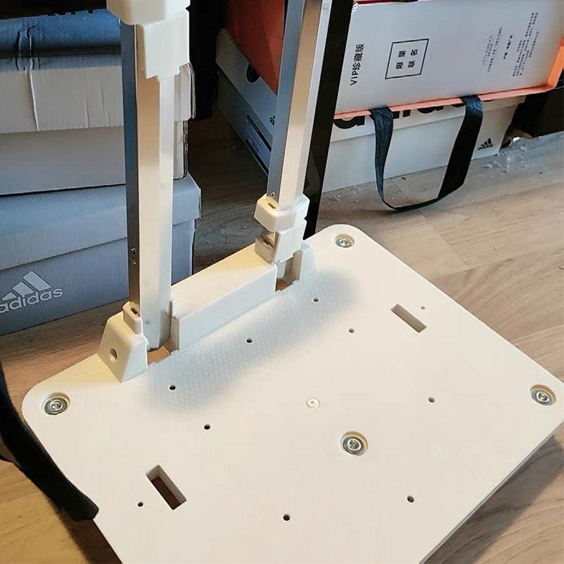 White trolley base attachment under pet carrier bag