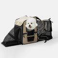 Beige aufklappbarer Haustier-Rucksack mit schwarzen Netzeinlagen und kleinem weißen Hund