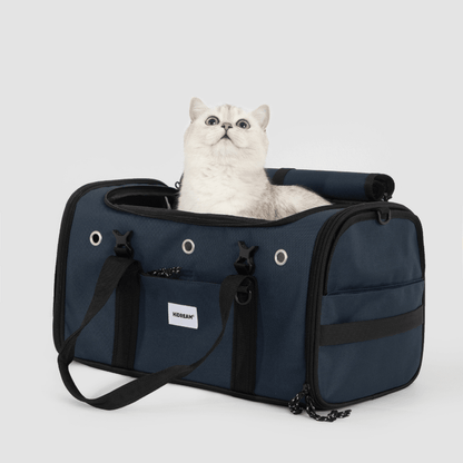 Dunkelblaue Toast-Stil Haustier-Tragetasche für Flugreisen mit weißer Katze darin sitzend